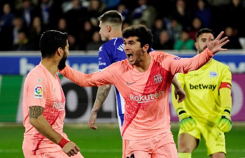 Barcelona`s Carles Alena celebrates scoring their first goal with Luis Suarez against Deportivo Alaves at Estadio Mendizorroza, Vitoria-Gasteiz, Spain on Apr 23, 2019. REUTERS