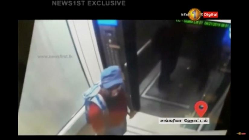 A man with a backpack is seen in Shangri La hotel elevator in Colombo, Sri Lanka, April 21, 2019 in this screen grab taken from a CCTV footage. SIRASA TV via REUTERS