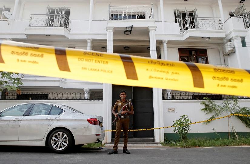 Police keep watch outside the family home of a bomber suspect where an explosion occurred during a Special Task Force raid, following a string of suicide attacks on churches and luxury hotels, in Colombo, Sri Lanka April 25, 2019. REUTERS