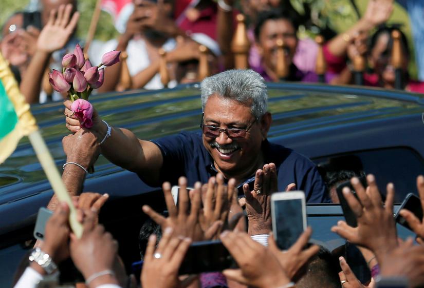 Sri Lanka`s former defense secretary Gotabaya Rajapaksa greets his supporters after his return from the United States, in Katunayake, Sri Lanka April 12, 2019. REUTERS/File Photo