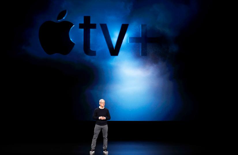 FILE PHOTO: Tim Cook, CEO of Apple, speaks during an Apple special event at the Steve Jobs Theater in Cupertino, California, U.S., March 25, 2019. REUTERS