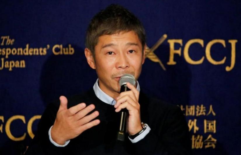 FILE PHOTO - Japanese billionaire Yusaku Maezawa, founder and chief executive of online fashion retailer Zozo, who has been chosen as the first private passenger by SpaceX, attends a news conference at the Foreign Correspondents` Club of Japan in Tokyo, Japan, October 9, 2018. REUTERS