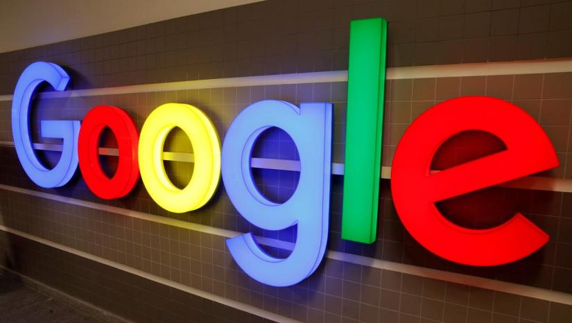 An illuminated Google logo is seen inside an office building in Zurich, Switzerland Dec 5, 2018. REUTERS/File Photo