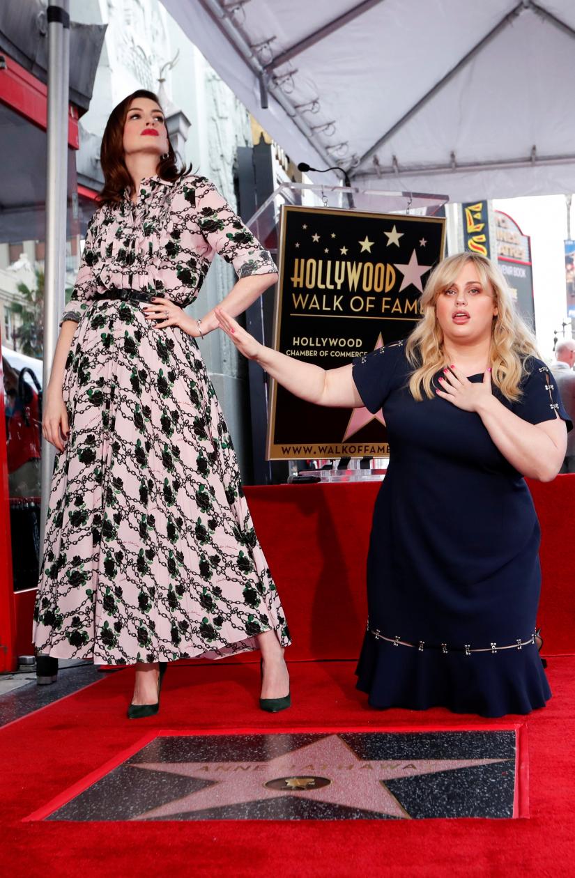 Anne Hathaway and Rebel Wilson pose during a ceremony to honor actor Anne Hathaway with a star on the Hollywood Walk of Fame in Los Angeles, California, U.S., May 9, 2019. REUTERS