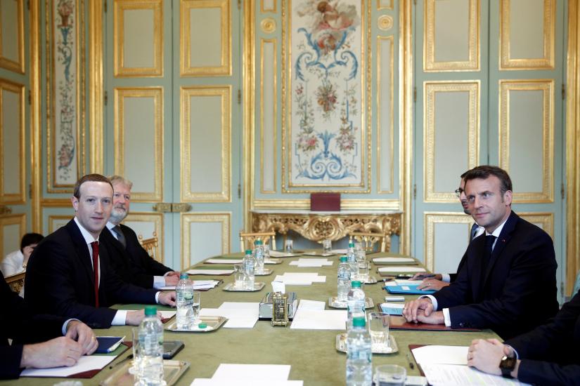 French President Emmanuel Macron meets with CEO and co-founder of Facebook Mark Zuckerberg at the Elysee Palace in Paris, France, May 10, 2019. REUTERS