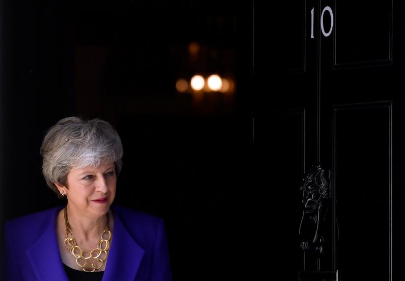 Britain`s Prime Minister Theresa May waits for Iceland`s Prime Minister Katrin Jakobsdottir at Downing Street in London, Britain May 2, 2019. REUTERS