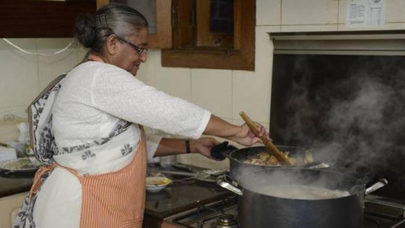 Prime Minister Sheikh Hasina is cooking food for her family members. Photo/Collected