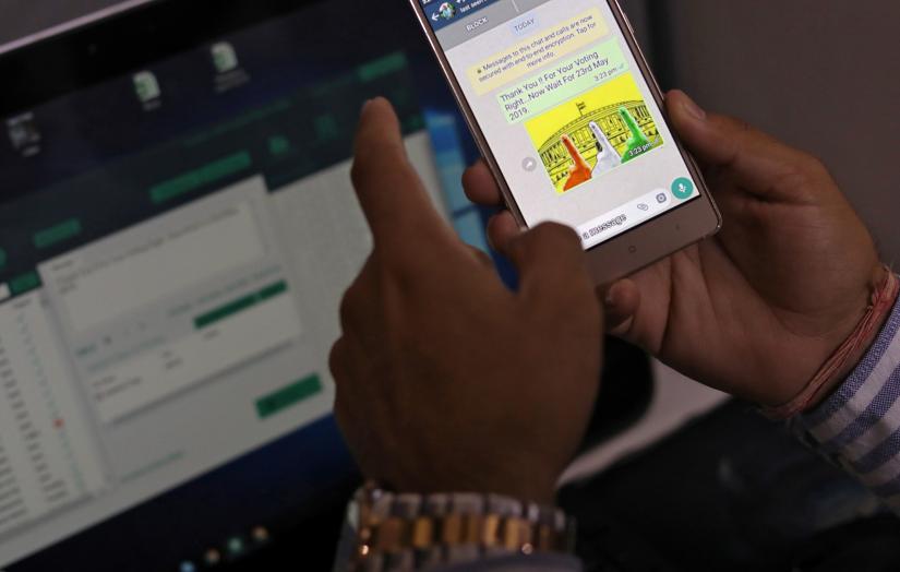Rohitash Repswal, a digital marketer, checks a WhatsApp message that he sent using a software tool that appears to automate the process of sending messages to WhatsApp users, inside his office in New Delhi, India, May 8, 2019. Picture taken May 8, 2019. REUTERS