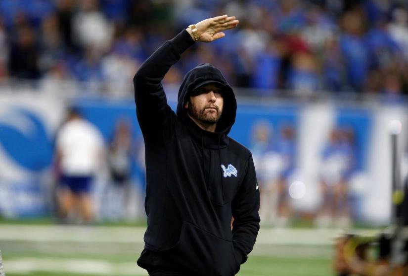 American rapper Marshall Mathers, professionally known as Eminem, reacts as he walks off the field after a pre-game coin toss between the Detroit Lions and the New York Jets before their NFL game in Detroit, Michigan, US Sept 10, 2018. REUTERS/File Photo