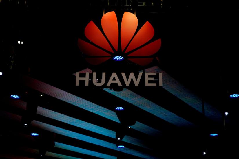 A Huawei logo is pictured during the media day for the Shanghai auto show in Shanghai, China April 16, 2019. REUTERS/File Photo
