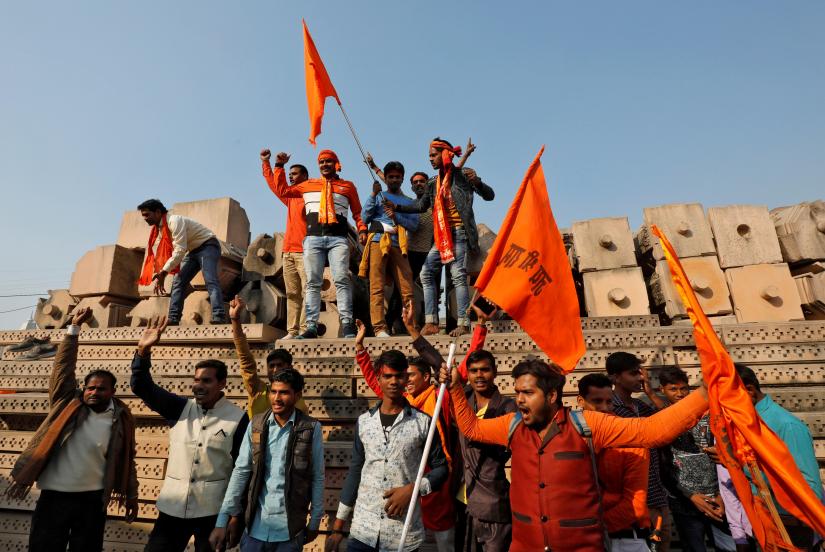 Supporters of the Vishva Hindu Parishad (VHP), a Hindu nationalist organisation, shout slogans after attending `Dharma Sabha` or a religious congregation organised by the VHP in Ayodhya, Uttar Pradesh, India, November 25, 2018. REUTERS/ File Photo