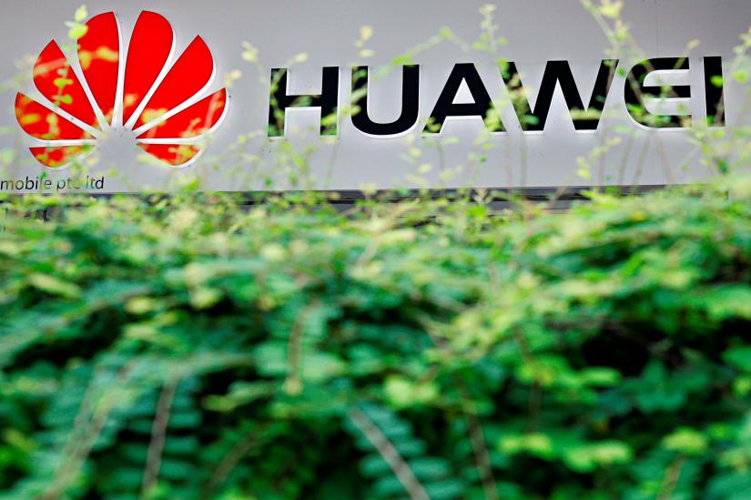 The logo of Huawei is pictured at a mobile phone shop in Singapore, May 21, 2019. REUTERS