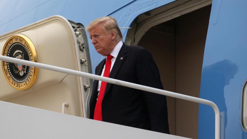 US President Donald Trump emerges from Air Force One as he returns to Washington at Joint Base Andrews, Maryland, US, May 17, 2019. REUTERS/File Photo