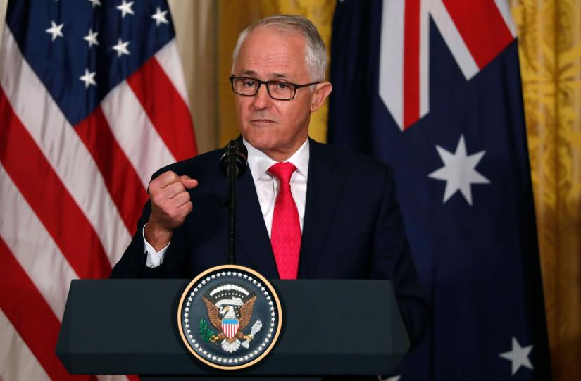 Australian Prime Minister Malcolm Turnbull speaks during a news conference with President Donald Trump at the White House in early 2018. The Australian leader warned about the risks posed by 5G during his visit. REUTERS