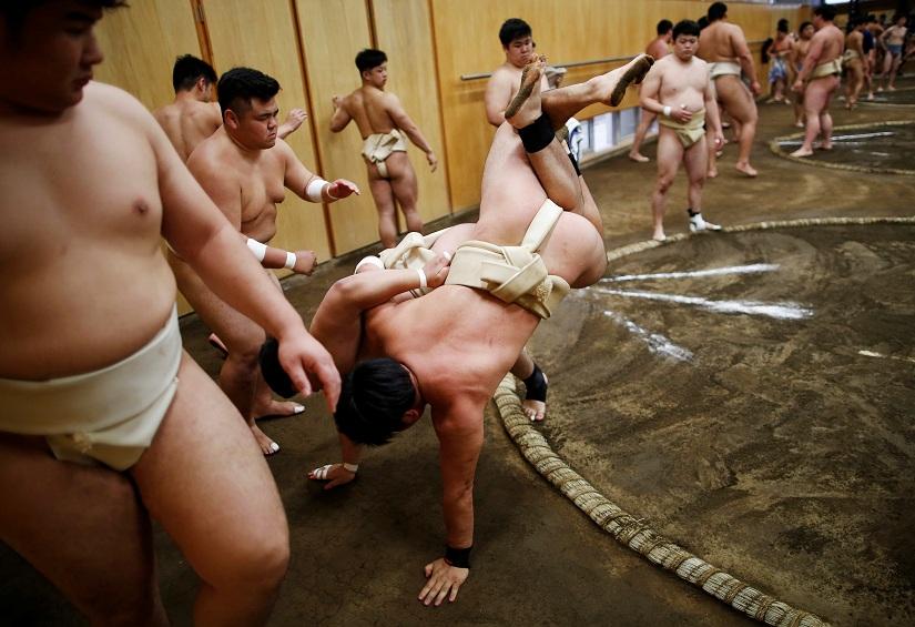 College students work out at the Sumo wrestling club at Nippon Sports Science University in Tokyo, Japan May 20, 2019. REUTERS