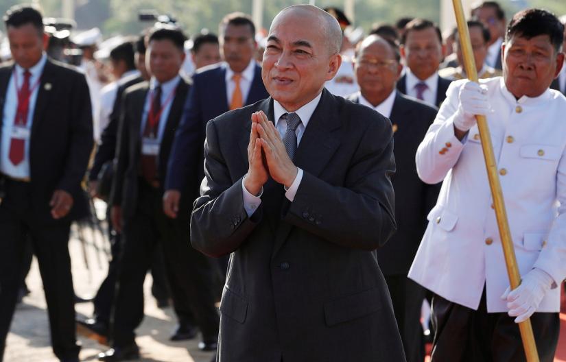 Cambodia`s King Norodom Sihamoni greets people as he attends a royal ploughing ceremony in Takeo province, Cambodia, May 22, 2019. REUTERS