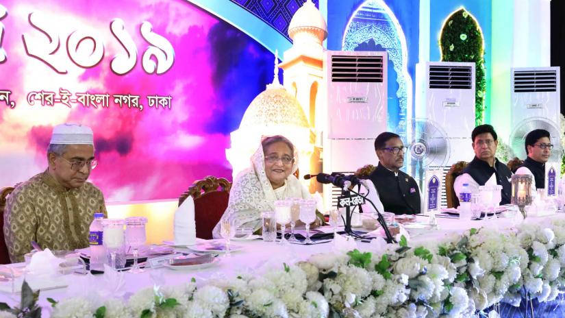 The prime minister speaks at an iftar at her official residence Ganabhaban on Thursday (May 23).  FOCUS BANGLA