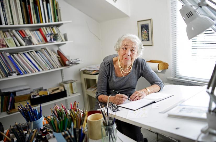 FILE PHOTO: British children`s writer and illustrator Judith Kerr chats as she sits by her desk at her home in west London, Britain September 30, 2015.REUTERS