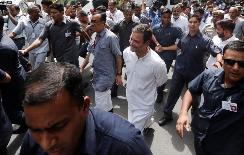 Rahul Gandhi, president of India`s main opposition Congress party, leaves after casting his vote at a polling station in New Delhi, India, May 12, 2019. REUTERS