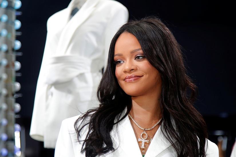 Pop superstar Rihanna poses in a pop-up store to present her first collection with LVMH for the new label, Fenty, which includes ready-to-wear and accessories, such as shoes, sunglasses and jewellery, Paris, France May 22, 2019. REUTERS