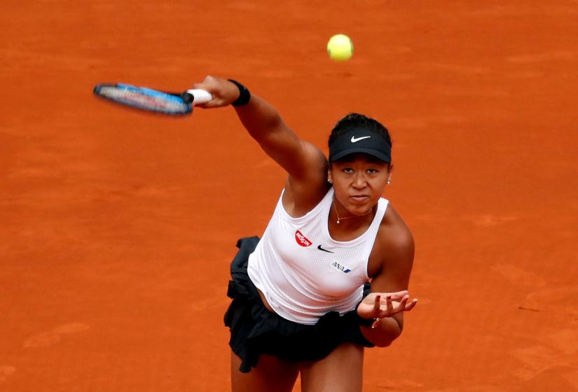 FILE PHOTO: Tennis - WTA Premier Mandatory - Madrid Open - The Caja Magica, Madrid, Spain - May 8, 2019 Japan`s Naomi Osaka in action during her third round match against Belarus` Aliaksandra Sasnovich REUTERS