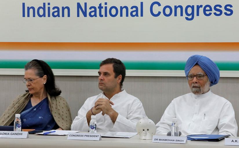 Rahul Gandhi, President of Congress party, his mother and leader of the party Sonia Gandhi and India`s former Prime Minister Manmohan Singh attend a Congress Working Committee (CWC) meeting in New Delhi, India, May 25, 2019. REUTERS