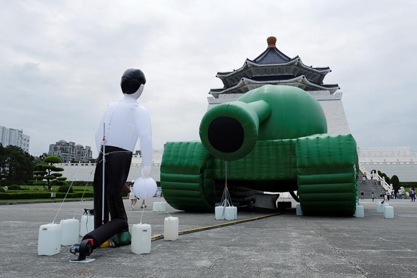 Giant balloons in the shape of a Chinese military tank and Tank Man are placed at the Liberty Square, ahead of June 4th anniversary of military crackdown on pro-democracy protesters in Beijing`s Tiananmen Square, in Taipei, Taiwan, May 21, 2019. REUTERS