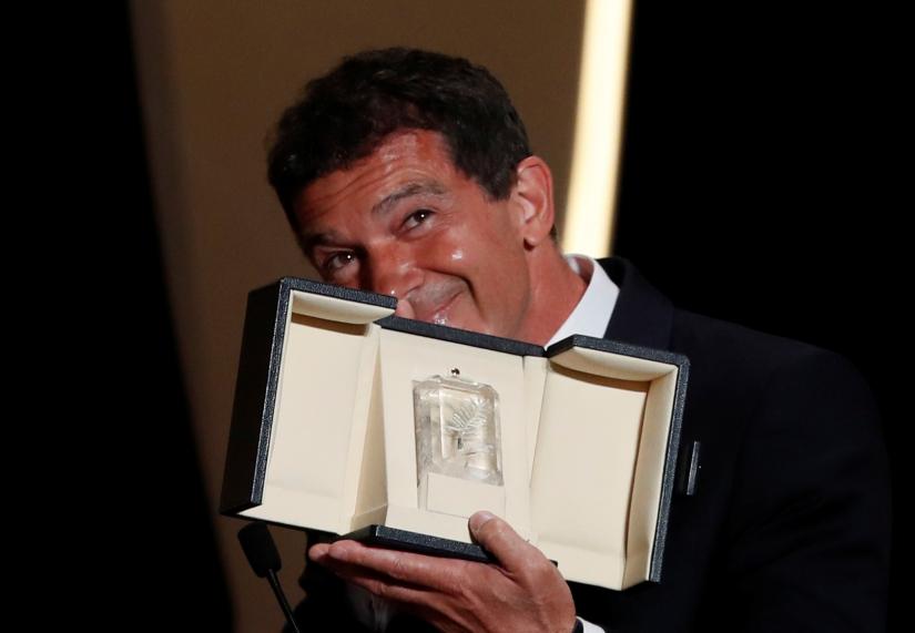 72nd Cannes Film Festival - Closing ceremony - Cannes, France, May 25, 2019. Antonio Banderas, Best Actor award winner for his role in the film “Pain and Glory`, reacts. REUTERS