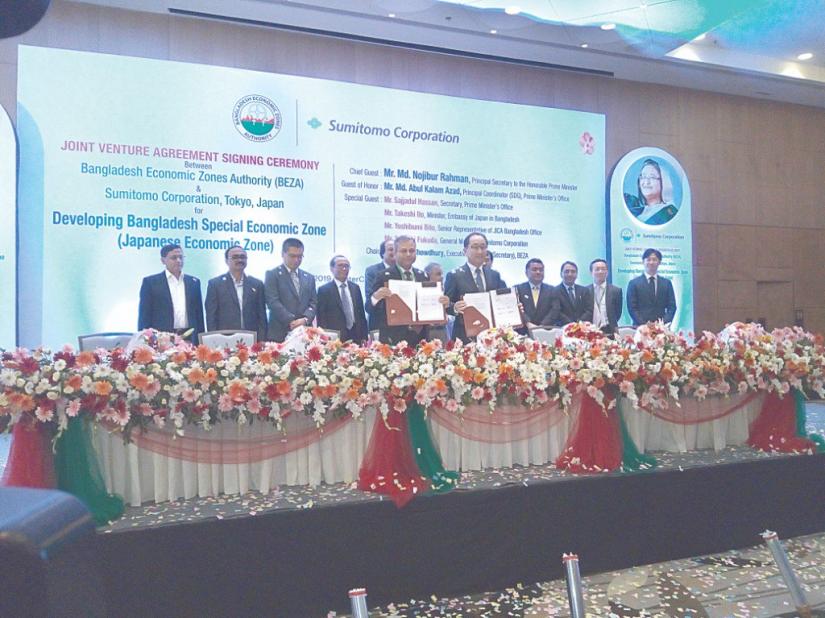 Bangladesh Economic Zones Authority (Beza) signs a joint venture agreement with Sumitomo Corporation of Japan for the development of an exclusive economic zone for Japanese investors, at a Dhaka hotel on Sunday COURTESY
