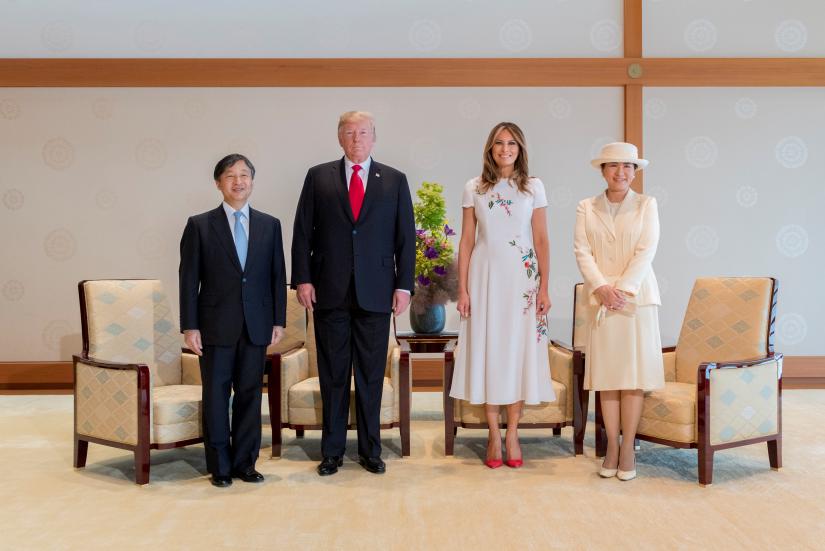 U.S. President Donald Trump and first lady Melania Trump pose for a photograph with Japan`s Emperor Naruhito and Empress Masako during their state call at the Imperial Palace in Tokyo, Japan May 27, 2019, in this photo released by Imperial Household Agency of Japan. Imperial Household Agency of Japan/Handout via Reuters