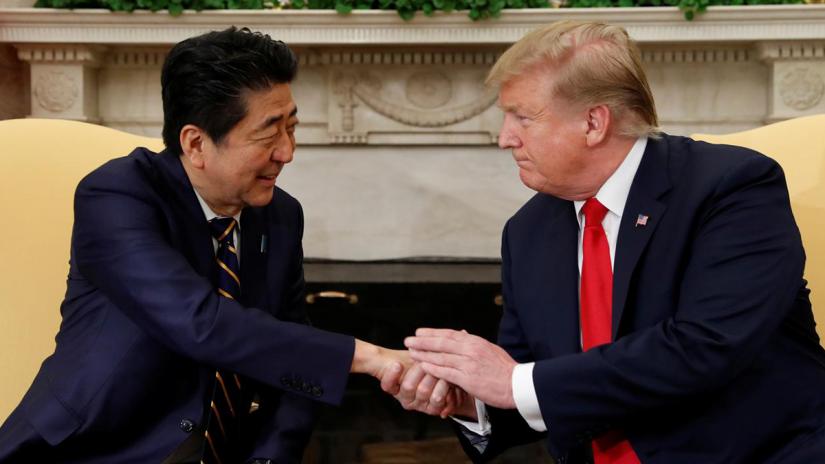 US President Donald Trump meets with Japan`s Prime Minister Shinzo Abe in the Oval Office at the White House in Washington, US, April 26, 2019. REUTERS/File Photo