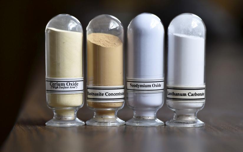 Samples of rare earth minerals from left, Cerium oxide, Bastnasite, Neodymium oxide and Lanthanum carbonate are on display during a tour of Molycorp`s Mountain Pass Rare Earth facility in Mountain Pass, California June 29, 2015. REUTERS/File Photo