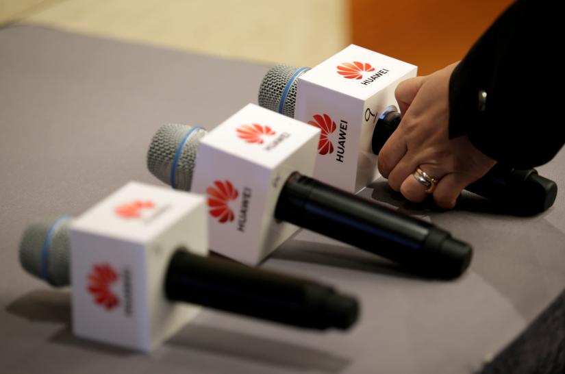 An employee prepares for a news conference on Huawei’s ongoing legal action against the U.S. government’s National Defense Authorization Act (NDAA) action at its headquarters in Shenzhen, Guangdong province, China May 29, 2019. REUTERS