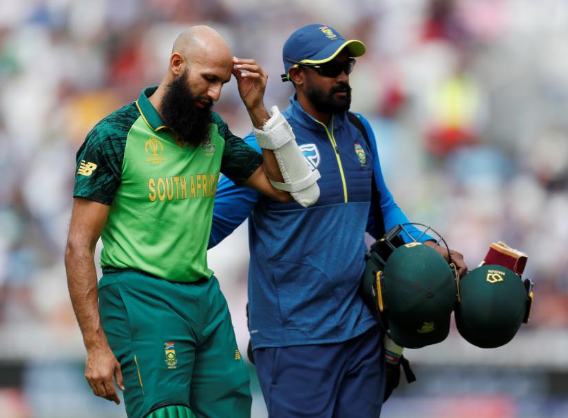 ICC Cricket World Cup - England v South Africa - Kia Oval, London, Britain - May 30, 2019 South Africa`s Hashim Amla retires from the match after being hurt by a ball from England`s Jofra Archer. ACTION IMAGES via REUTERS