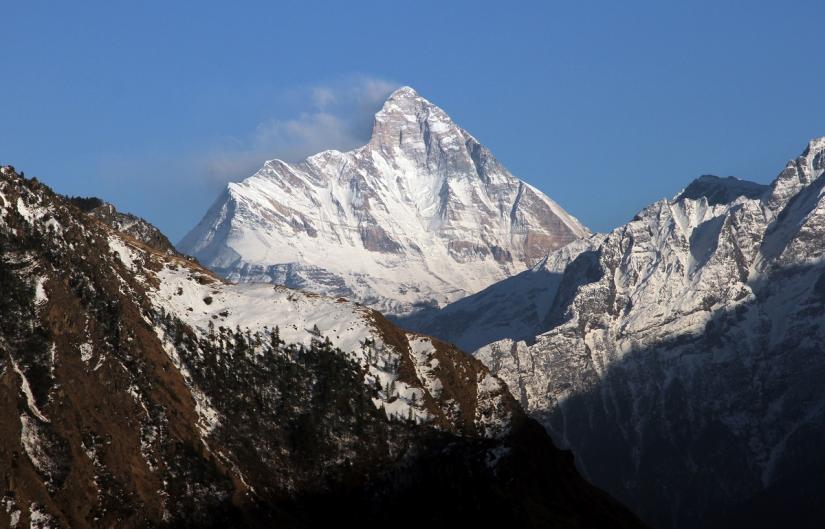 Snow-covered Nanda Devi mountain is seen from Auli town, in the northern Himalayan state of Uttarakhand, India February 25, 2014. Picture taken February 25, 2014. REUTERS