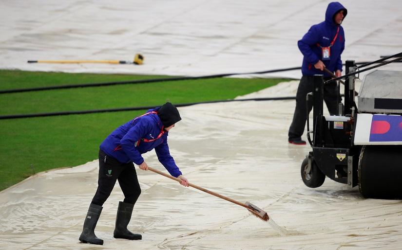 Groundstaff work on the field during a rain delay - ICC Cricket World Cup - Bangladesh v Sri Lanka - The County Ground, Bristol, Britain - June 11, 2019. Reuters
