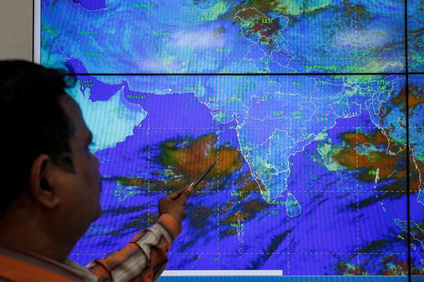 An India Meteorological Department scientist monitors Cyclone Vayu inside his office in Ahmedabad, India, June 11, 2019. REUTERS