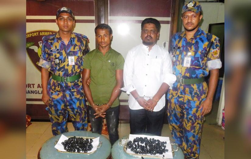 Airport Armed Police presents two Rohingyas before media, arrested from Hazrat Shahjalal International Airport on Wednesday, Jun 12, 2019.