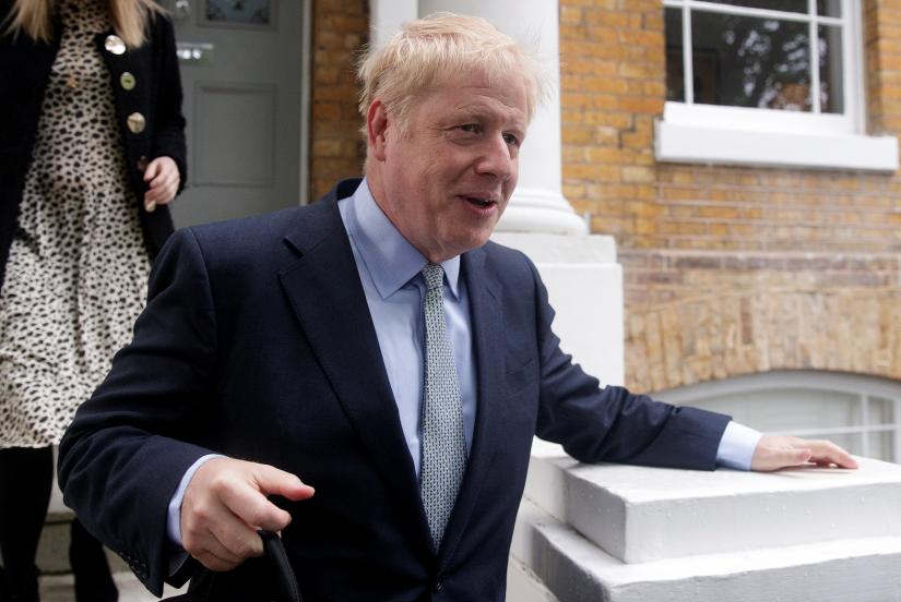 PM hopeful Boris Johnson leaves his home in London, Britain, June 13, 2019. REUTERS
