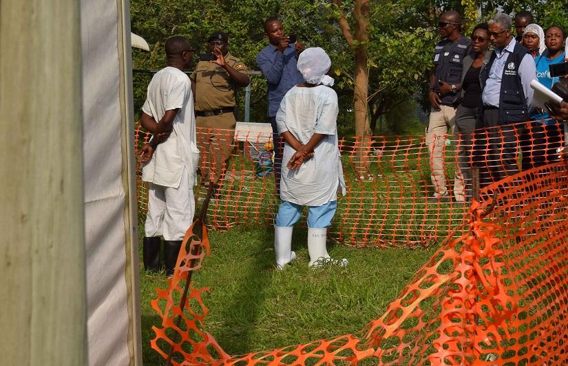 World Health Organization (WHO) officials talk to Ugandan medical staff as they inspect ebola preparedness facilities at the Bwera general hospital near the border with the Democratic Republic of Congo in Bwera, Uganda, June 12, 2019. REUTERS