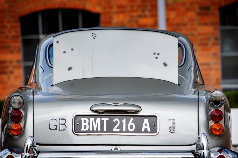 A raised rear bullet-proof screen of an original Aston Martin DB5 car, one of just three surviving examples, fitted with James Bond specifications as pictured in the film Goldfinger which will be offered for auction by RM Sotheby`s, is shown in this photo provided June 12, 2019. Simon Clay © 2019 Courtesy of RM Sotheby’s/Handout via REUTERS