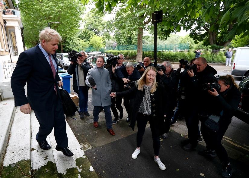 PM hopeful Boris Johnson leaves his home in London, Britain, June 14, 2019. REUTERS