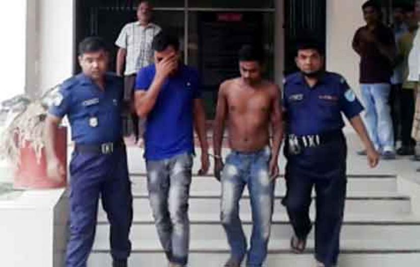 Police escort accused bus driver and helper from a Manikganj court on Sunday, June 16, 2019