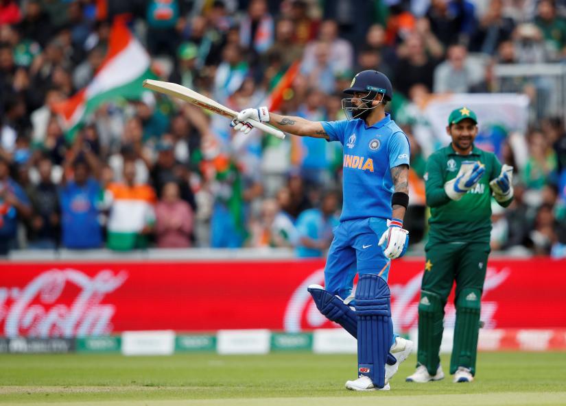 Cricket - ICC Cricket World Cup - India v Pakistan - Emirates Old Trafford, Manchester, Britain - June 16, 2019 India`s Virat Kohli celebrates his 50 Action Images via Reuters