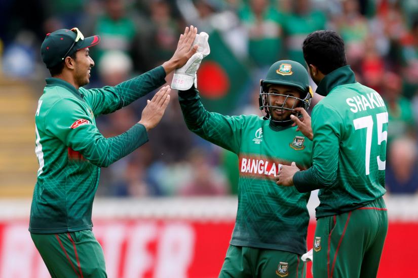 Cricket - ICC Cricket World Cup - West Indies v Bangladesh - The County Ground, Taunton, Britain - June 17, 2019 Bangladesh`s Soumya Sarkar celebrates after taking a catch to dismiss West Indies Nicholas Pooran Action Images via Reuters