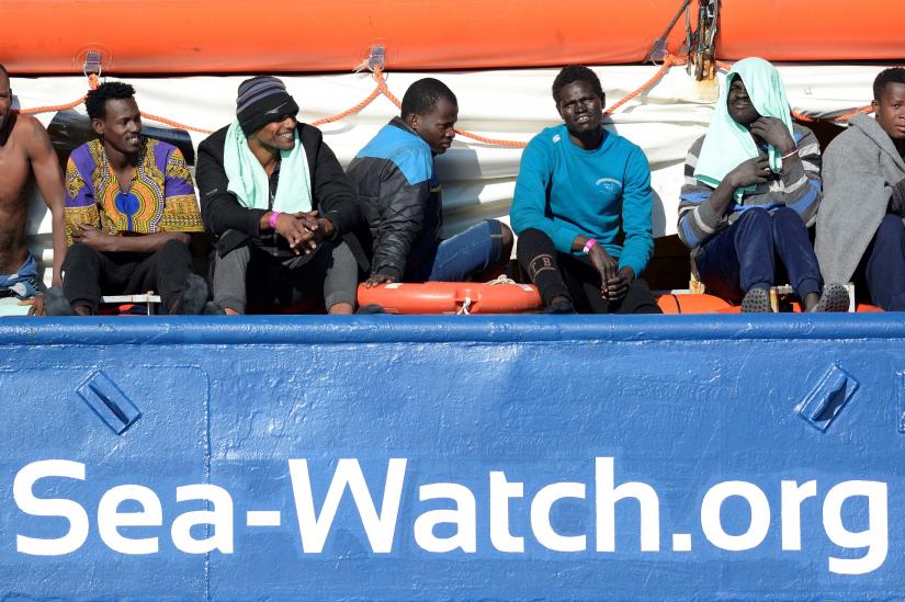 Migrants rest on board the Sea Watch 3 off the coast of Siracusa, Italy, January 27, 2019. REUTERS