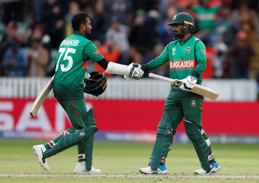 Cricket - ICC Cricket World Cup - West Indies v Bangladesh - The County Ground, Taunton, Britain - June 17, 2019 Bangladesh`s Shakib Al Hasan and Liton Das celebrate winning the match Action Images via Reuters