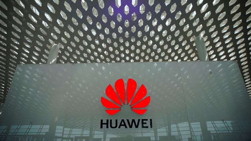 A Huawei company logo is seen at the Shenzhen International Airport in Shenzhen in Shenzhen, Guangdong province, China June 17, 2019. REUTERS