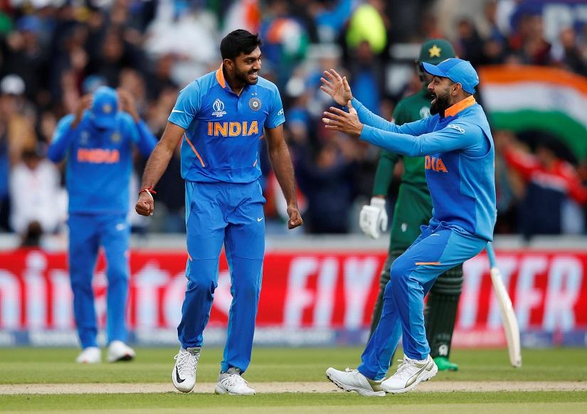 India`s Vijay Shankar celebrates the wicket of Pakistan`s Imam-ul-Haq with team mates - ICC Cricket World Cup - India v Pakistan - Emirates Old Trafford, Manchester, Britain - June 16, 2019. Reuters