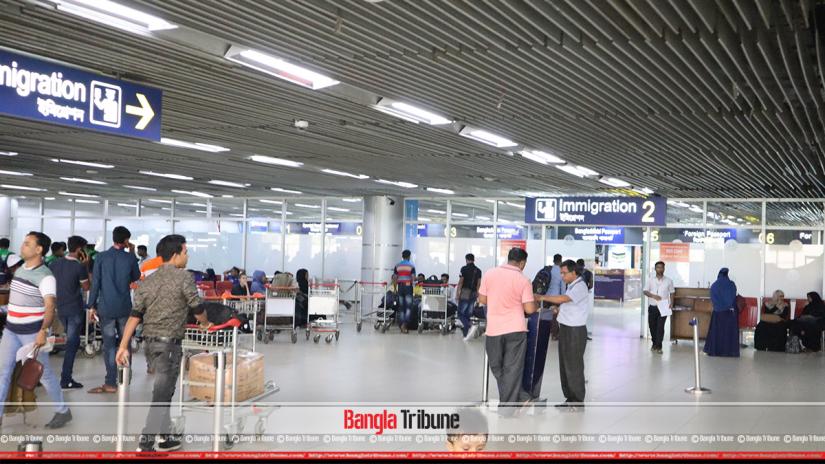 Immigration at Hazrat Shahjalal International Airport in Dhaka.